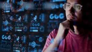 homem analisando símbolos gráficos